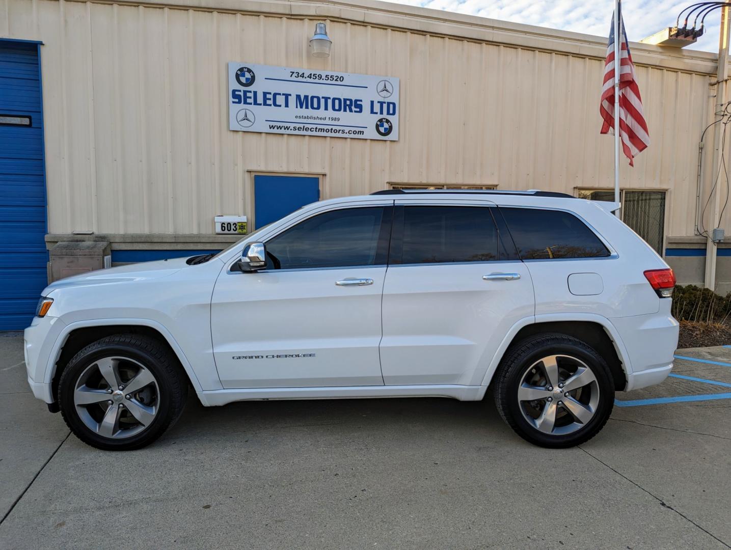 2014 White /Nepal Tan Jeep Grand Cherokee (1C4RJFCGXEC) with an 3.6L V6 DOHC 24V engine, Automatic transmission, located at 603 Amelia Street, Plymouth, MI, 48170, (734) 459-5520, 42.378841, -83.464546 - Vehicles shown by appointment - Please call ahead - 734-459-5520, text 734-658-4573 or contact us via our web site at: http://www.selectmotors.com for complete Inventory, Photos, Videos and FREE Carfax Reports. 2014 Jeep Grand Cherokee Overland, Bright White/Nepal Tan interior, 116K miles, all wh - Photo#1